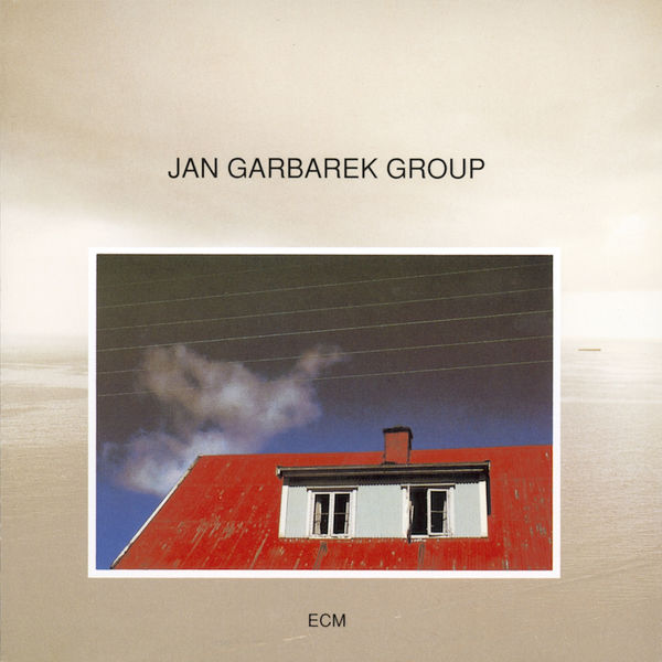 Jan Garbarek Group - Photo With Blue Sky, White Cloud, Wires, Windows And A Red R Jan Garbarek Group - Photo With Blue Sky, White Cloud, Wires, Windows And A Red R